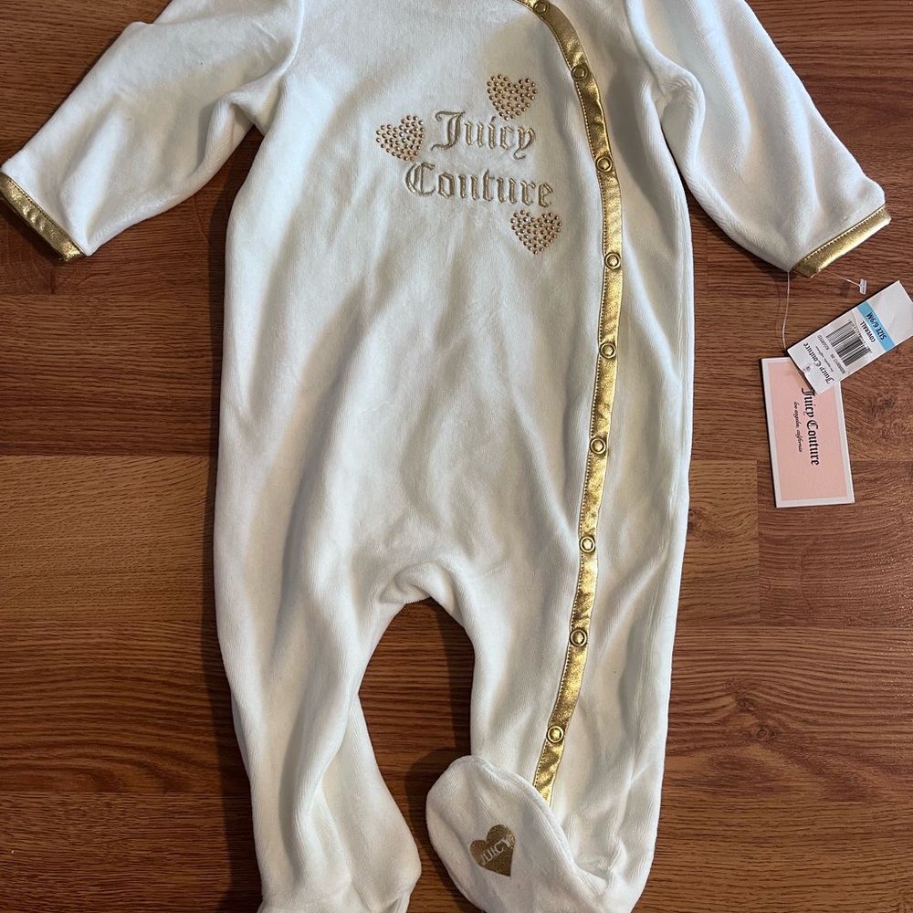 NWT Baby Juicy Couture. 6-9 months. White with gold accents. Snap closure.